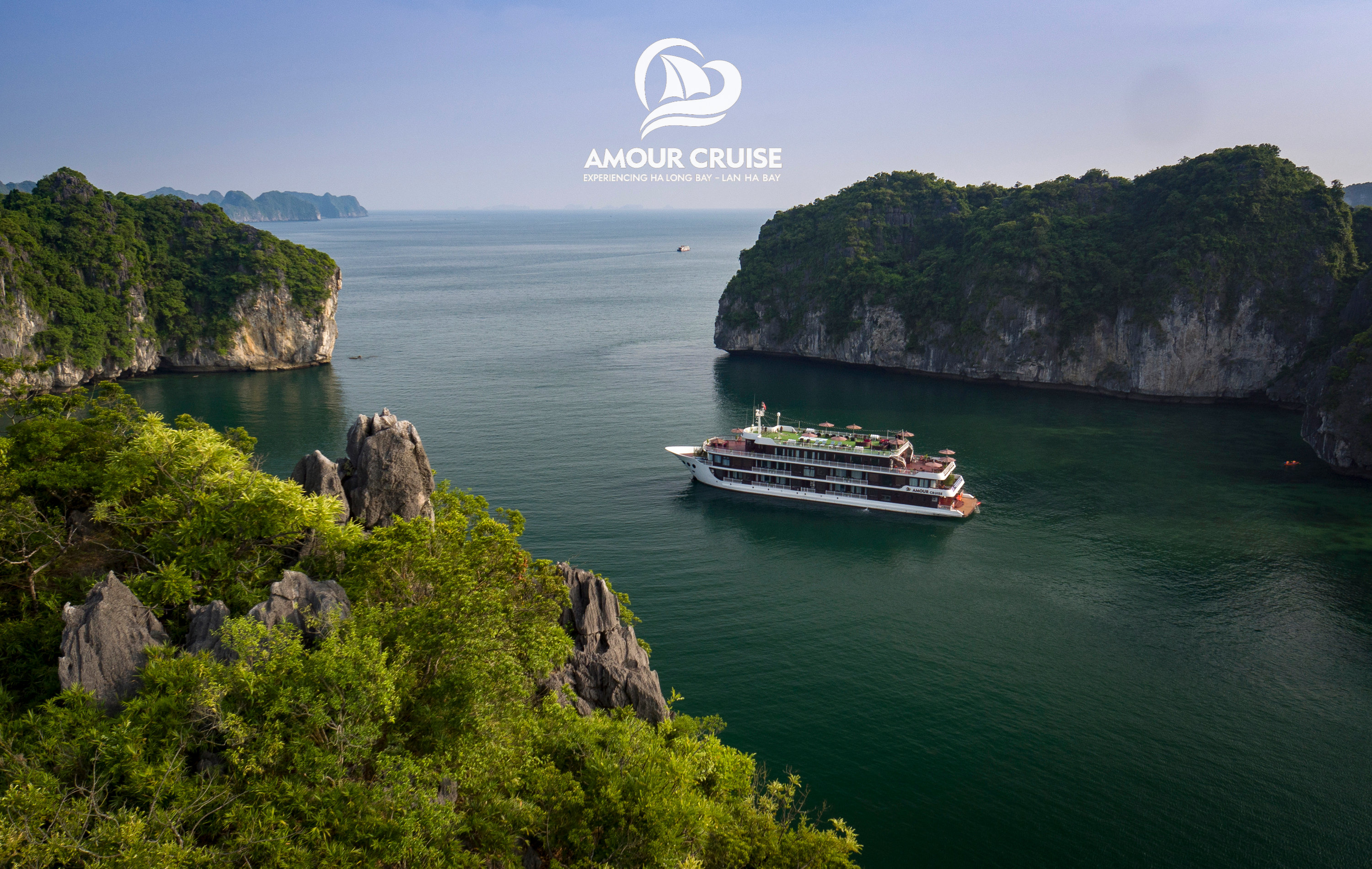 Amour Cruises floating elegantly like a sanctuary of romance in Lan Ha Bay